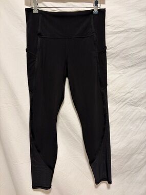 Athleta Black and Sheer Mesh Vitality Stash Pocket 7/8 Tight EUC Medium